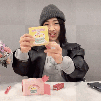 Woman Holding Card With Cake GIF