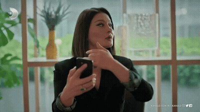 Woman Holding Cell Phone GIF