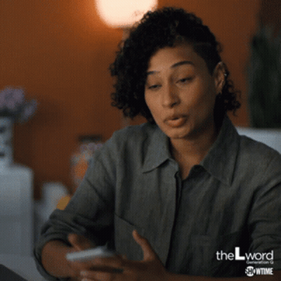 Woman Holding Cell Phone Saying Wants To GIF