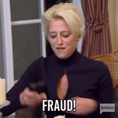 Woman Holding Cell Phone Says Fraud GIF