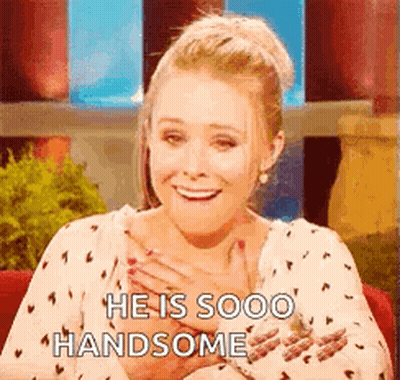Woman Holding Chest Man Saying He Sooo Handsome GIF