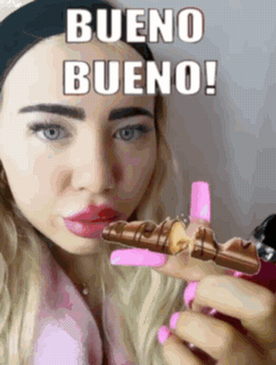 Woman Holding Chocolate Saying Bueno Bueno GIF