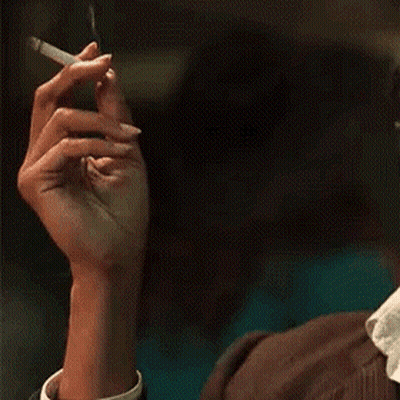 Woman Holding Cigarette GIF