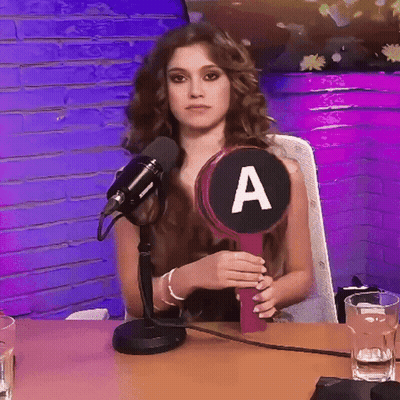 Woman Holding Circle With Letter A GIF