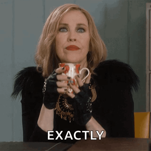 Woman Holding Coffee Cup Says Exactly GIF