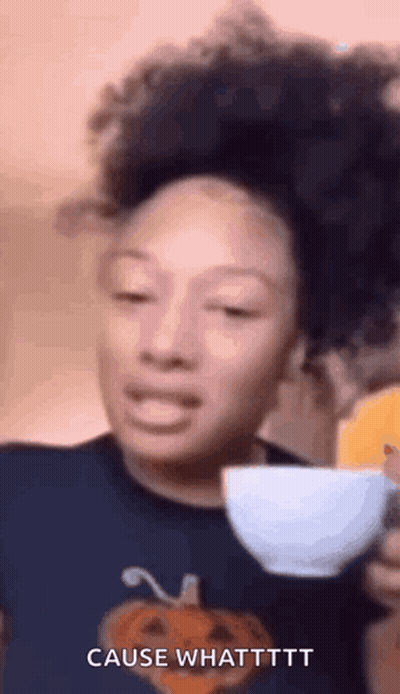 Woman Holding Coffee Making Face GIF