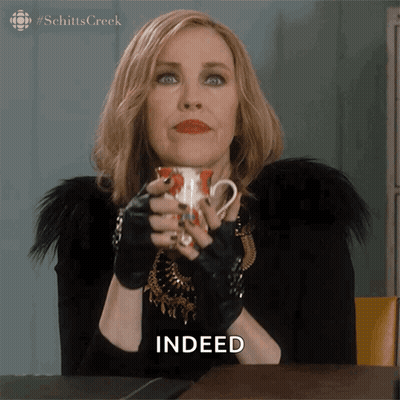 Woman Holding Coffee With Indeed GIF