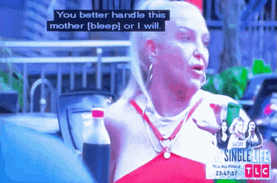 Woman Holding Coke Says You Better Handle This Mother [Bleep] Or I Will GIF