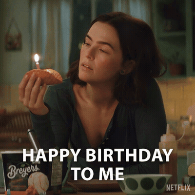 Woman Holding Croissant With Candle Saying Happy Birthday To Me GIF