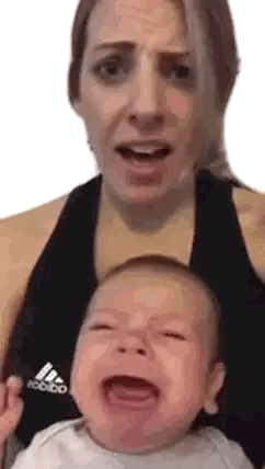 Woman Holding Crying Baby In Adidas Tank Sticker