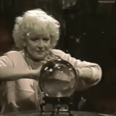 Woman Holding Crystal Ball In Front Of Face GIF