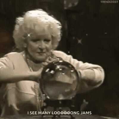 Woman Holding Crystal Ball Says I See Many Looooong Jams GIF