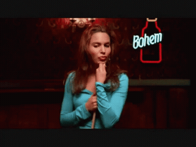 Woman Holding Cue Stick By Pool Table GIF