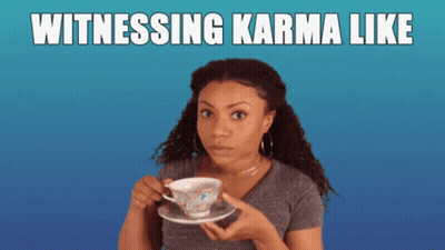 Woman Holding Cup Of Tea Witnessing Karma Like GIF