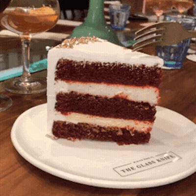 Woman Holding Dessert Plate With Heart GIF
