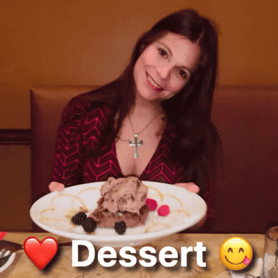 Woman Holding Dessert Plate With Heart GIF