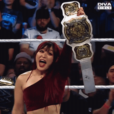Woman Holding Diva Bible Wrestling Championship Belt GIF