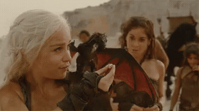 Woman Holding Dragon GIF