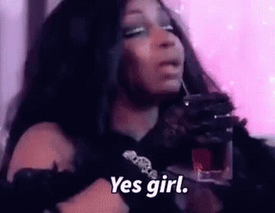 Woman Holding Drink Saying Yes Girl GIF
