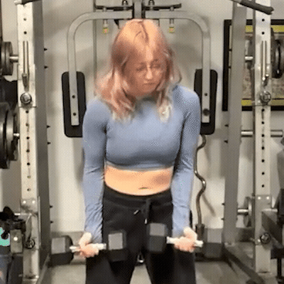 Woman Holding Dumbbell In Gym GIF