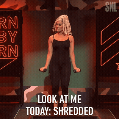 Woman Holding Dumbbells Look At Me Today Shredded GIF