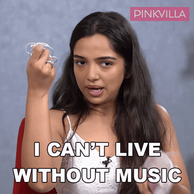 Woman Holding Earbuds Says I Can't Live Without Music GIF
