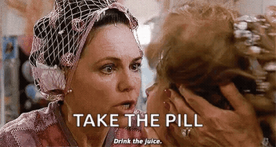 Woman Holding Face Telling To Take Pill And Drink Juice GIF