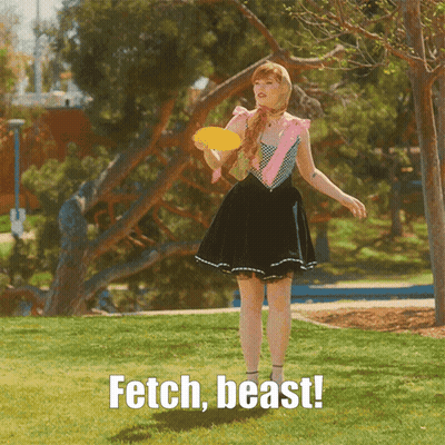 Woman Holding Frisbee Saying Fetch Beast GIF