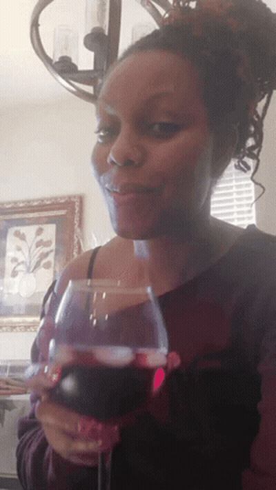 Woman Holding Glass Of Red Wine GIF