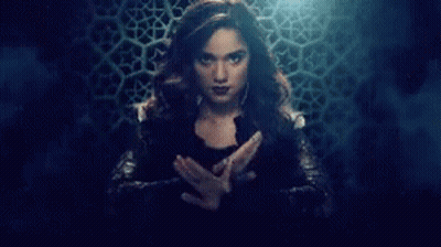 Woman Holding Glowing Object GIF