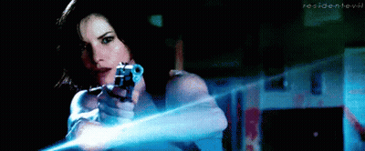 Woman Holding Gun In Dark Room Resident Evil GIF