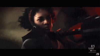 Woman Holding Gun In Front Of E3 Live Advertisement GIF