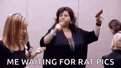 Woman Holding Gun Next To Another Woman GIF