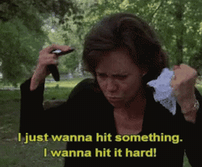 Woman Holding Gun Saying I Just Wanna Hit Something GIF