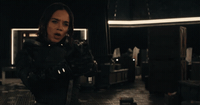 Woman Holding Gun Saying Who Are You GIF