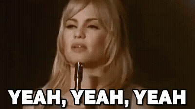 Woman Holding Gun Saying Yeah Yeah Yeah GIF