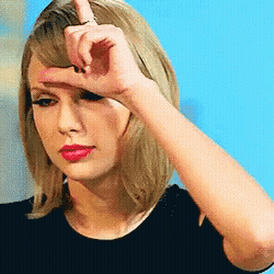 Woman Holding Hand To Forehead Making Funny Face GIF
