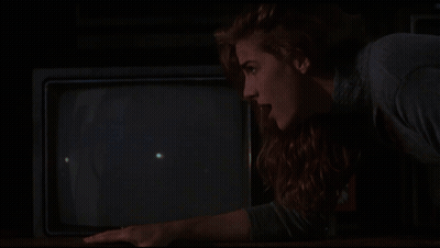 Woman Holding Hand To Forehead With Ring GIF