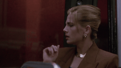 Woman Holding Hand To Forehead With Ring GIF