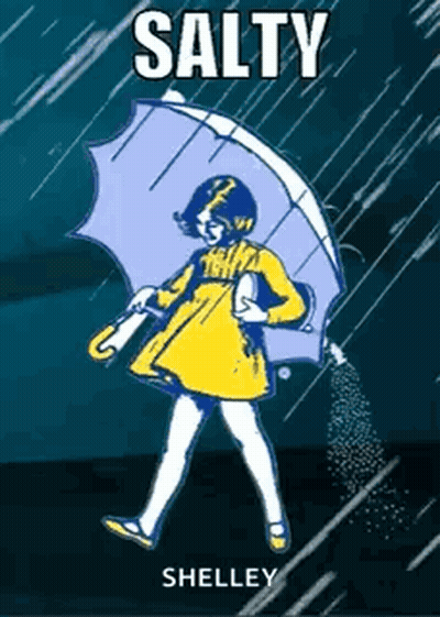 Woman Holding Hands Up In Front Of American Idol Sign GIF