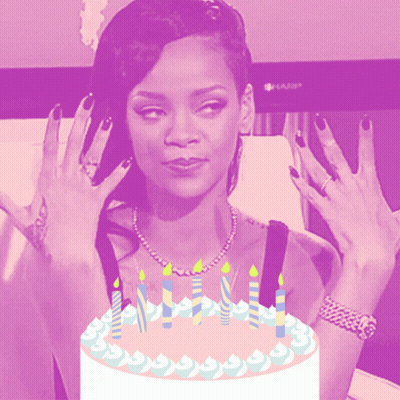 Woman Holding Hands Up In Front Of Birthday Cake GIF
