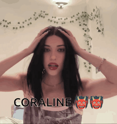 Woman Holding Head Coraline GIF