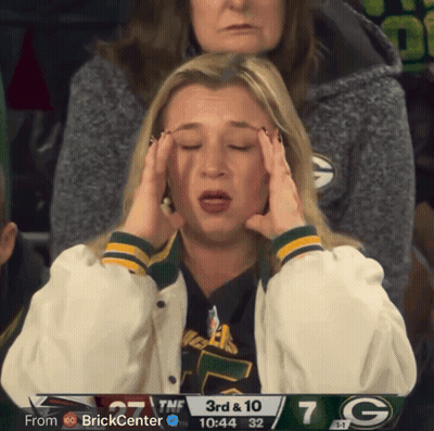 Woman Holding Head In Front Of 3Rd & 10 Scoreboard GIF