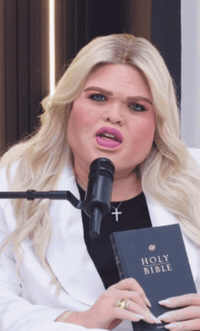 Woman Holding Holy Bible GIF