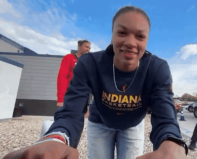 Woman Holding Indiana Jersey GIF