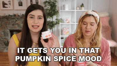 Woman Holding Jar Next To Woman Saying It Gets You In That Pumpkin Spice Mood GIF