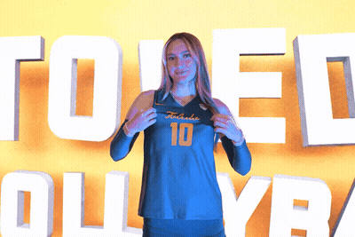 Woman Holding Jersey Number 10 GIF