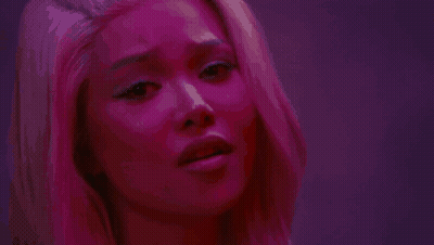 Woman Holding Knife In Dark Room GIF