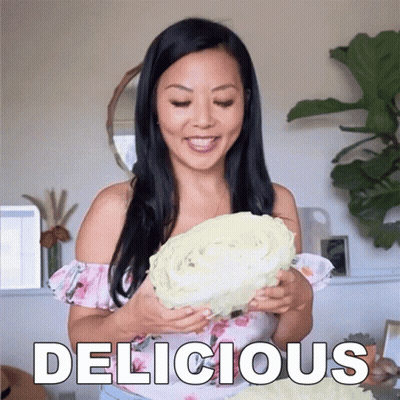 Woman Holding Large Cabbage Saying Delicious GIF