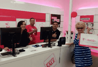 Woman Holding Magenta Sale Bag At T-Mobile Store GIF